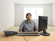 Man seated in isolated room