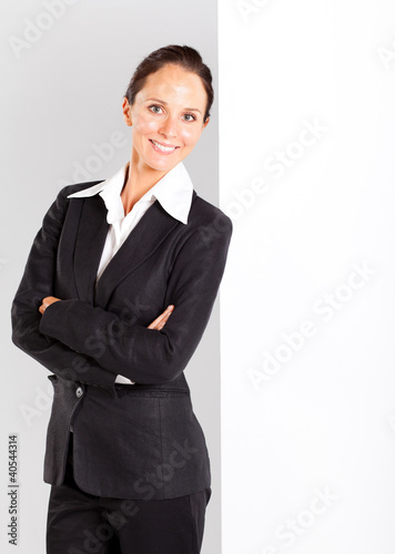 Photo: businesswoman lean on white board businesswoman lean on white board