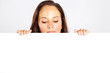 caucasian woman behind and looking down at white board