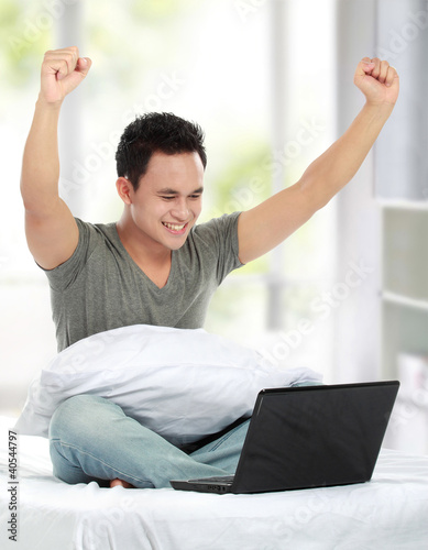 Photo: Happy with laptop Happy with laptop