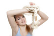 young woman with tied up hands over white