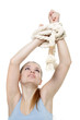 Photo: young woman with tied up hands over white young woman with tied up hands over white