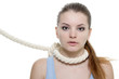 young woman with rope on her neck over white