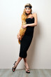 beautiful woman in a black dress. Studio portrait.