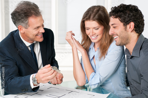 Photo: Couple dreaming new house Couple dreaming new house