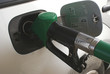 Refueling the car with expensive gasoline
