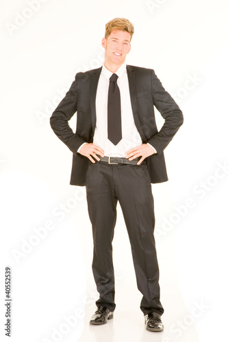 Photo: businessman with hands on hips businessman with hands on hips