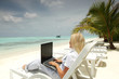 tropical business woman with laptop