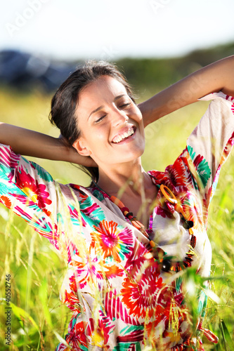 Photo: Beautiful woman in country field Beautiful woman in country field
