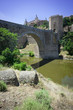 Alcantara bridge over river Tajo in Toledo. The Alcazar is set i