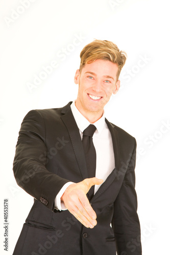 Photo: businessman extending his hand businessman extending his hand