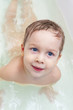 Baby taking bath and swim on chest