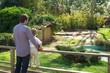 Dad with his son in a zoo.