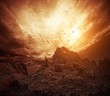 Foto: Dramatic sky over rocks. Dramatic sky over rocks.