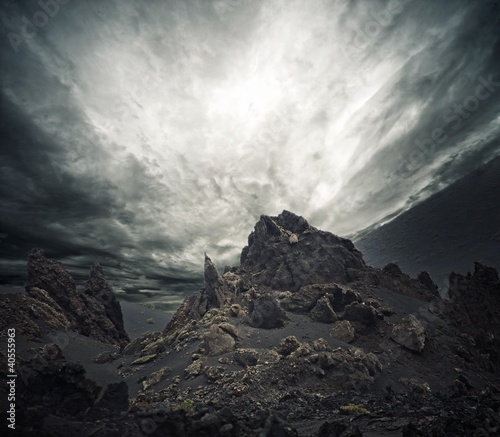 Photo: Dramatic sky over rocks. Dramatic sky over rocks.