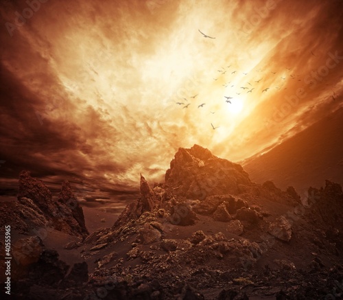 Photo: Dramatic sky over rocks. Dramatic sky over rocks.