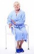 Photo: elderly woman, disabled, with shower seat as a medical supply elderly woman, disabled, with shower seat as a medical supply