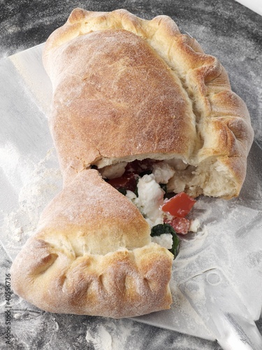 Photo: Spinach Ricotta Calzone; Broken on Paddle Spinach Ricotta Calzone; Broken on Paddle