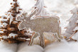 Chocolate elk biscuit in winter forest