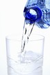 Pouring mineral water into a glass