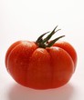 Beefsteak tomato with drops of water