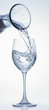 Pouring water into glass from carafe