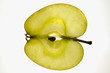 Slice of apple (sliced lengthwise), backlit