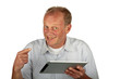 Happy man pointing at his tablet computer