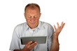 Astonished business man with his tablet computer