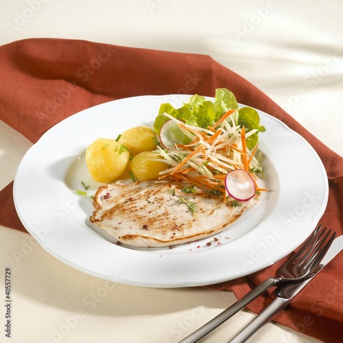 Photo: Turkey escalopes with boiled potatoes and salad Turkey escalopes with boiled potatoes and salad