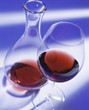 Red wine in glass and carafe