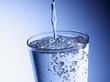 Pouring water into a glass