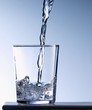 Pouring water into a glass