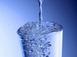 Pouring water into a glass