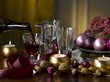 Table with Christmas decorations and red wine