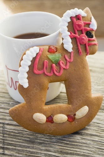Photo: Gingerbread rocking horse and mug of cocoa Gingerbread rocking horse and mug of cocoa