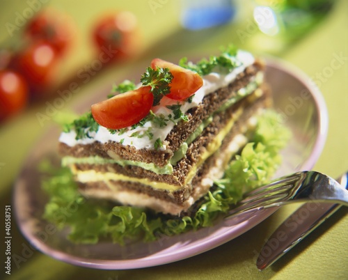 Photo: Wholegrain bread layered with fish, curry & avocado spread Wholegrain bread layered with fish, curry & avocado spread