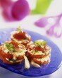 Tomatoes with mozzarella and garlic stuffing