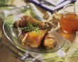 Roast chicken legs with honey and garlic marinade