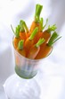 Caramelised carrots with herb sauce in a glass