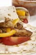 Fajitas filled with pork and peppers