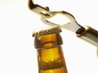 Beer bottle neck with crown cap and bottle opener