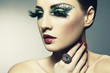 Fashion photo of a young woman with long eyelashes