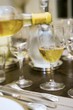 White wine being poured into a glass