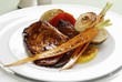 Marinated turkey escalopes with roasted vegetables
