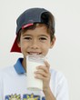 Boy holding a glass of milk