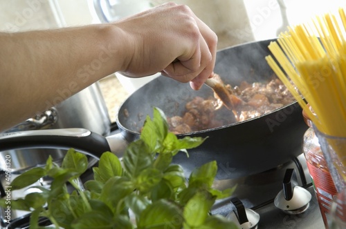 Photo: Sautéing meat in a frying pan Sautéing meat in a frying pan