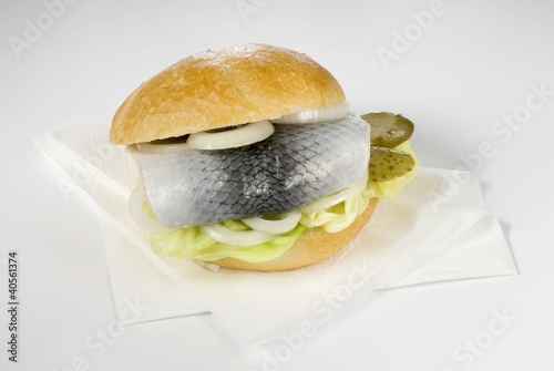 Photo: Herring roll with gherkin and onion Herring roll with gherkin and onion