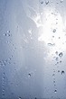 Drops of water on a sheet of glass