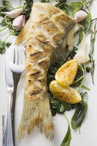 Photo: Fried sea bass with herbs, garlic and lemon Fried sea bass with herbs, garlic and lemon
